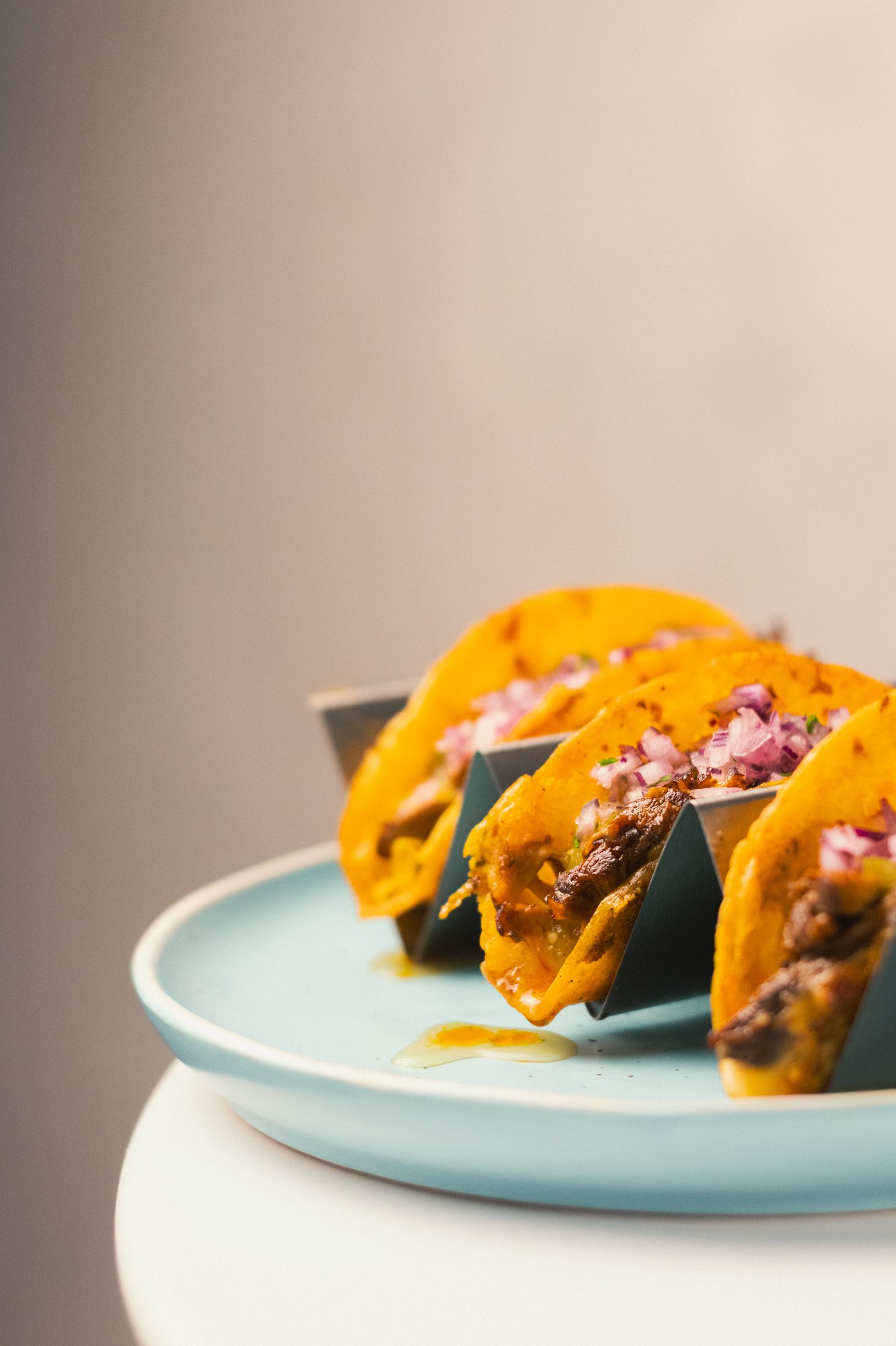 Birria beef tacos with red onion and coriander at Cheat Day in Ericeira